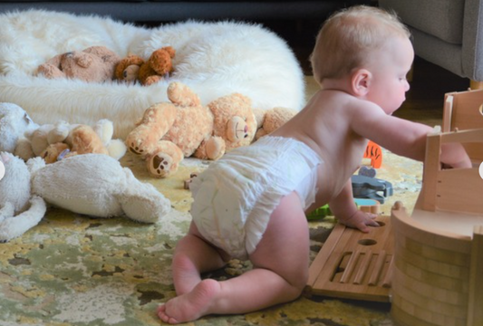 Baby Playing In Eco Friendly Nappies